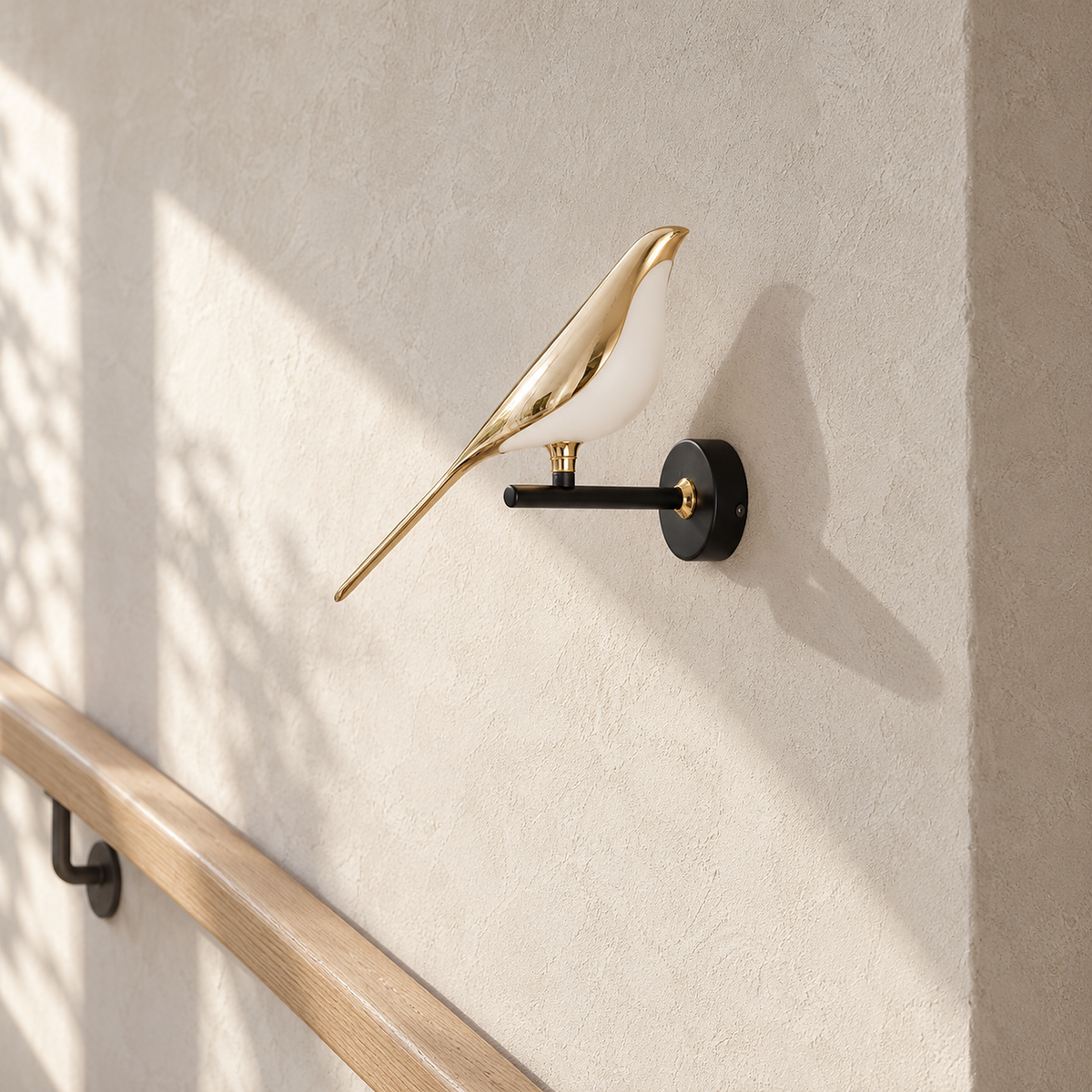 Corsavel 1 bird gold and black wall lamp unlit on a stair landing in daylight