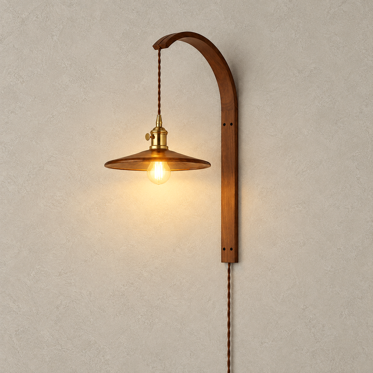Cosineri walnut color plug in wall sconce model A lit alone on a plain plate at 64 cm tall