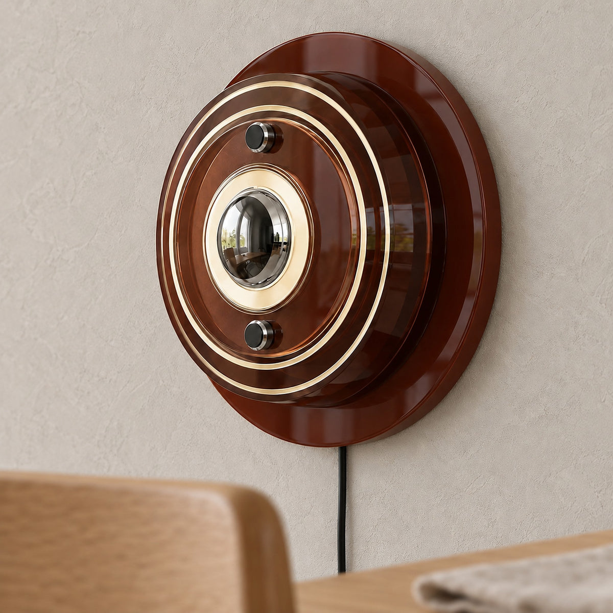 Elsarvo brown plug in wall light close up of acrylic edges and the semi electroplated bulb