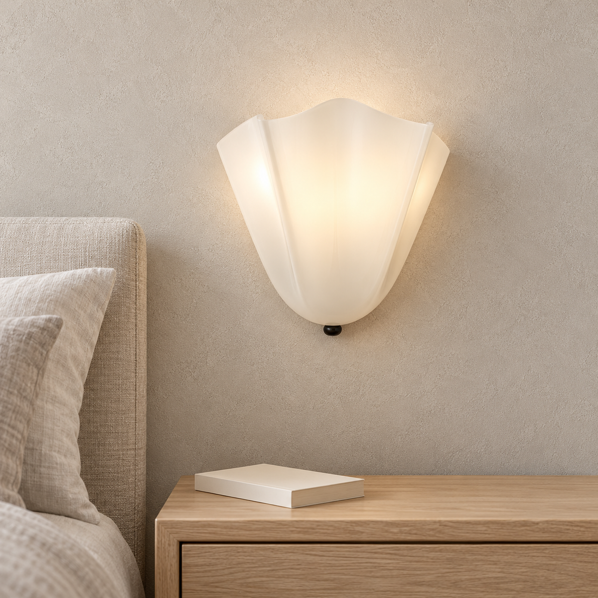 Ilsaren milky white wall lamp, frosted glass shade lit in a bright daylight bedroom #color_milky white