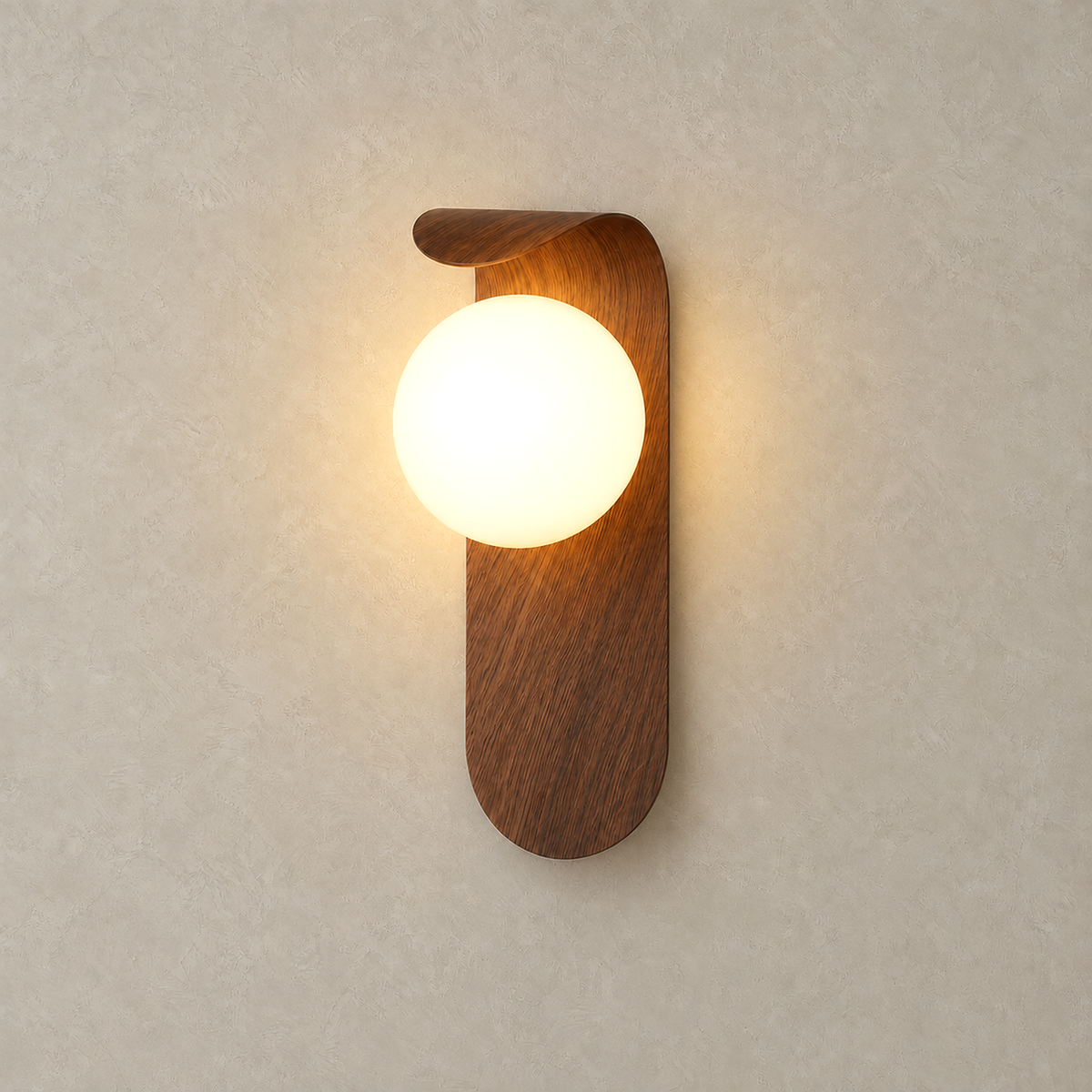 Ilvarne walnut bedside wall light with its single globe lit in warm light against a plain backdrop