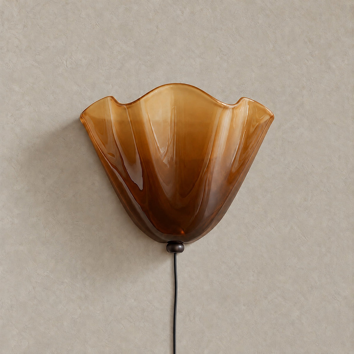 Lanorvi brown glass bedside wall light shown unlit on a plaster wall #color_brown