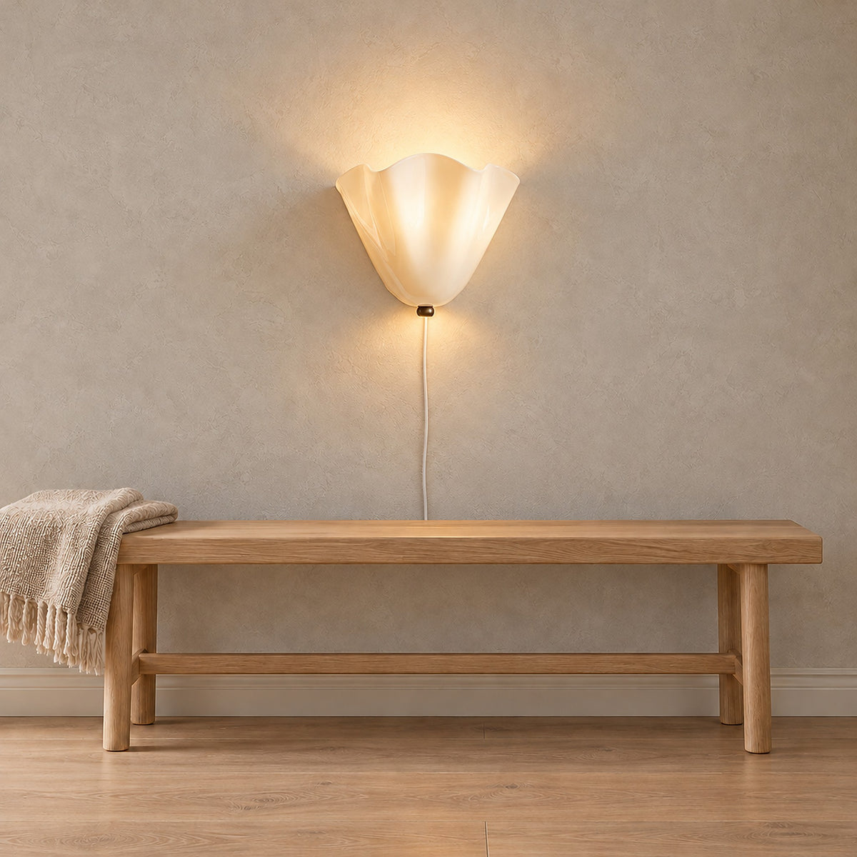 Lanorvi ivory glass wall light mounted above a stair landing bench, leaving it clear