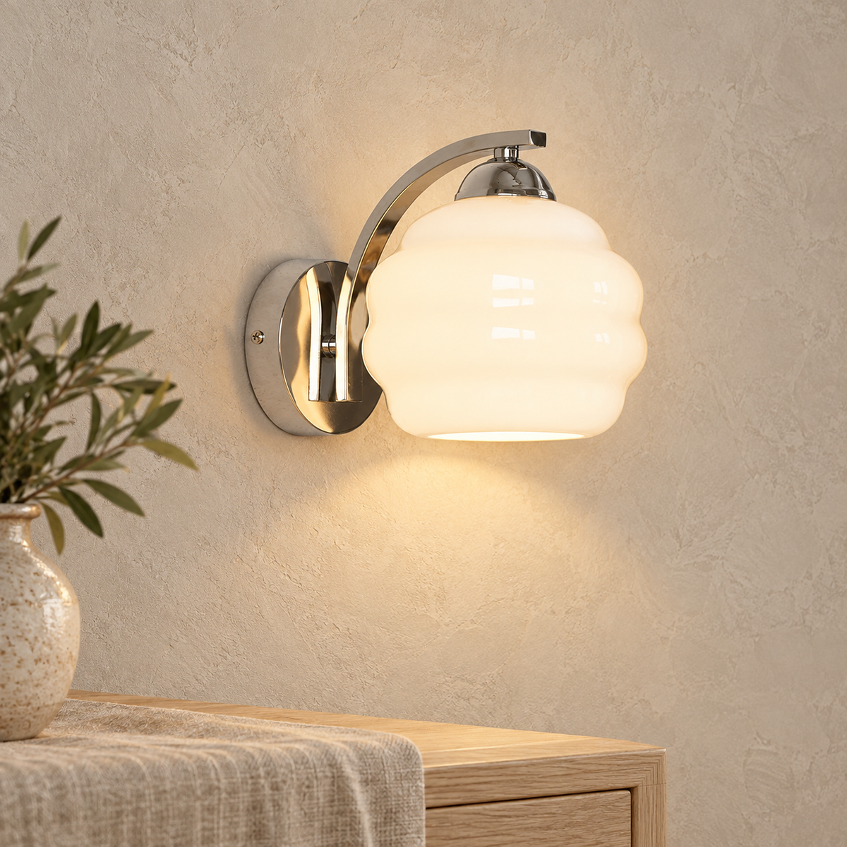Lasemiro silver and white wall lamp glowing above a dining sideboard in daylight