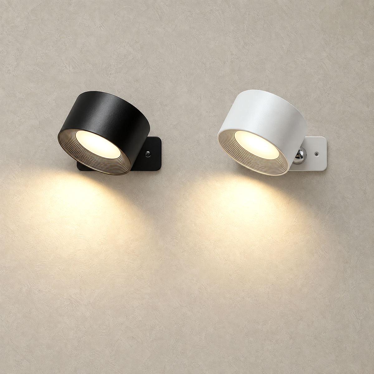 Lasirel black and white LED wall sconces shown lit together side by side