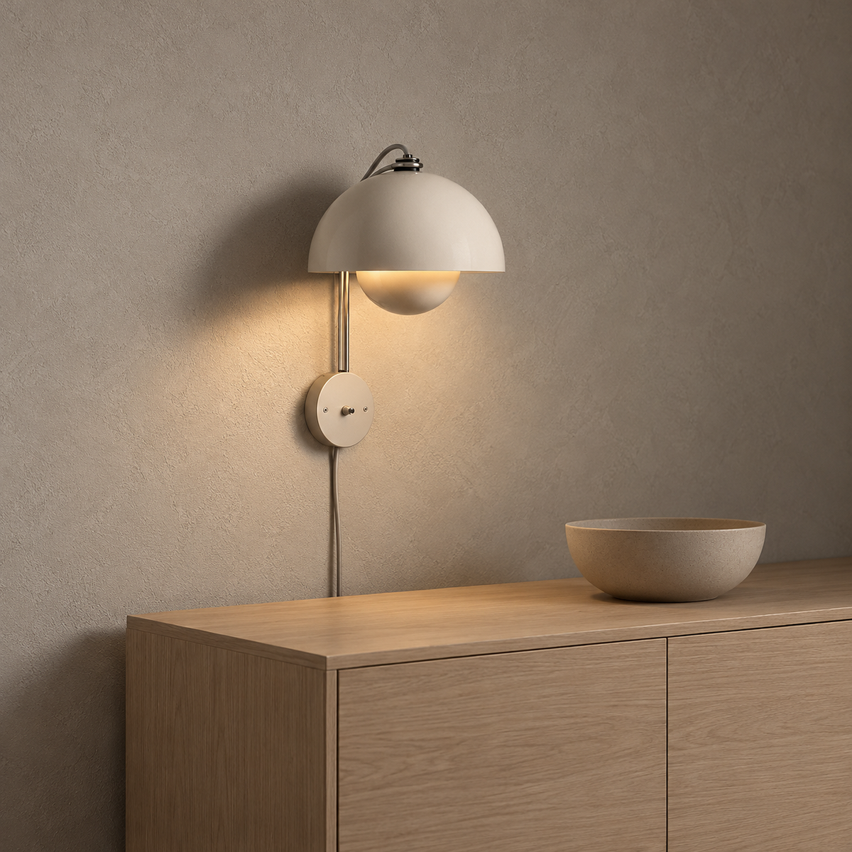Lasorme cream wall lamp glowing warm white over an uncluttered dining room sideboard