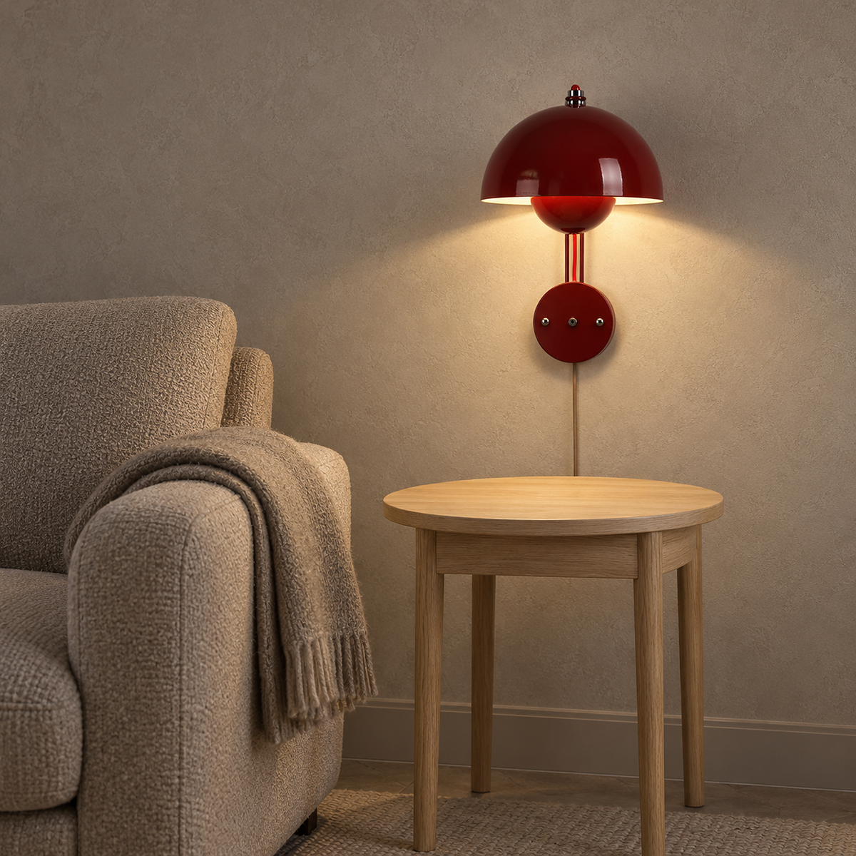 Lasorme red wall sconce lighting the plaster beside an oatmeal reading chair #color_red