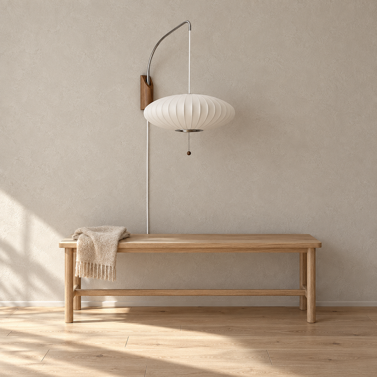 Lavomel chrome and walnut tone plug in wall light, broad and unlit, mounted above an entry bench