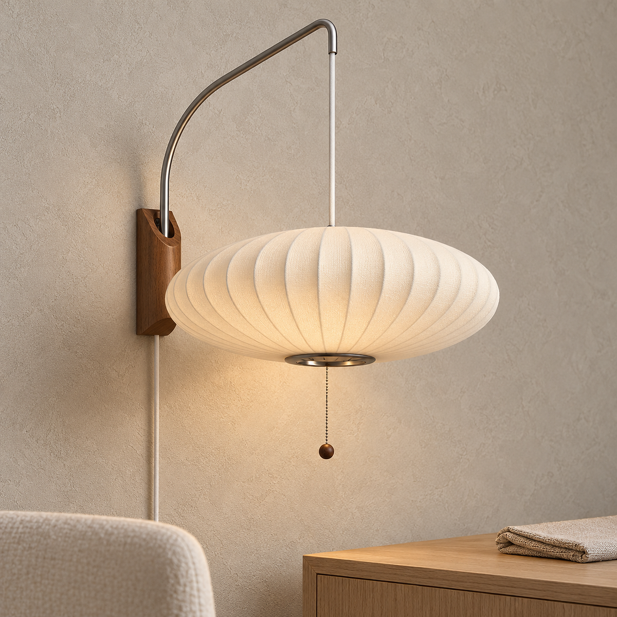 Lavomel chrome and walnut tone wall lamp glowing above the corner of a dining sideboard in a dining nook