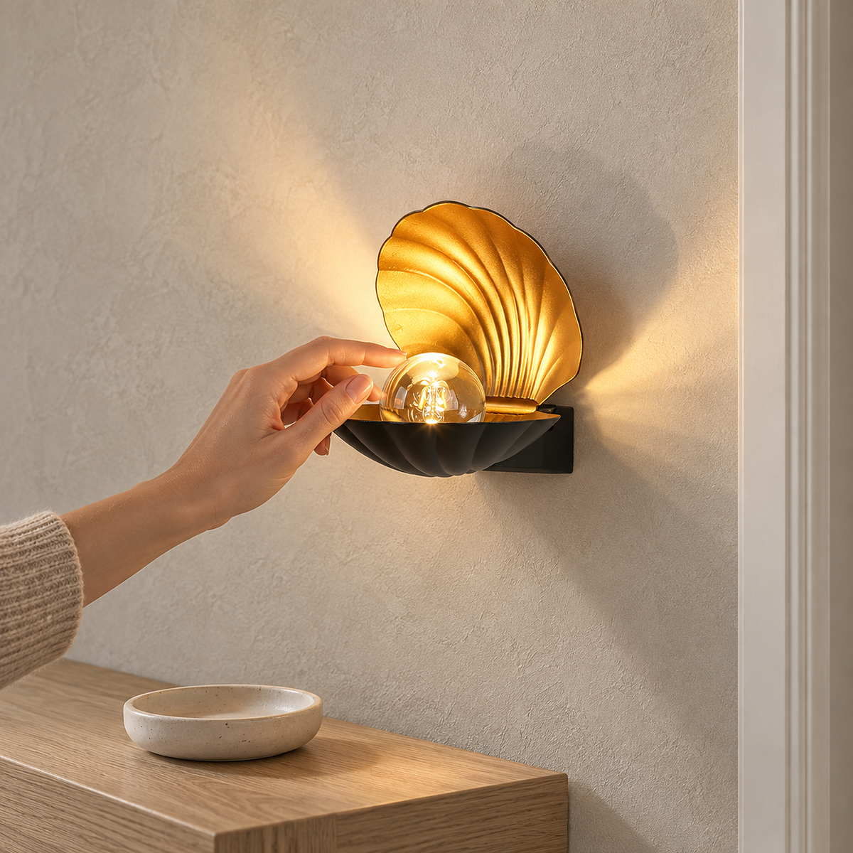 Leravio black LED wall sconce lit beside a hallway door jamb in daylight