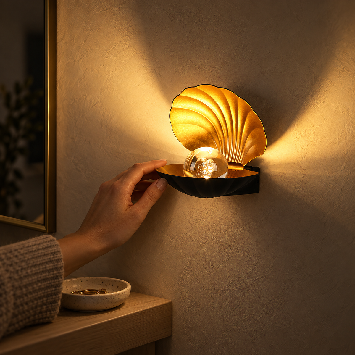 Leravio black LED wall sconce lit beside an entryway mirror and ledge at night