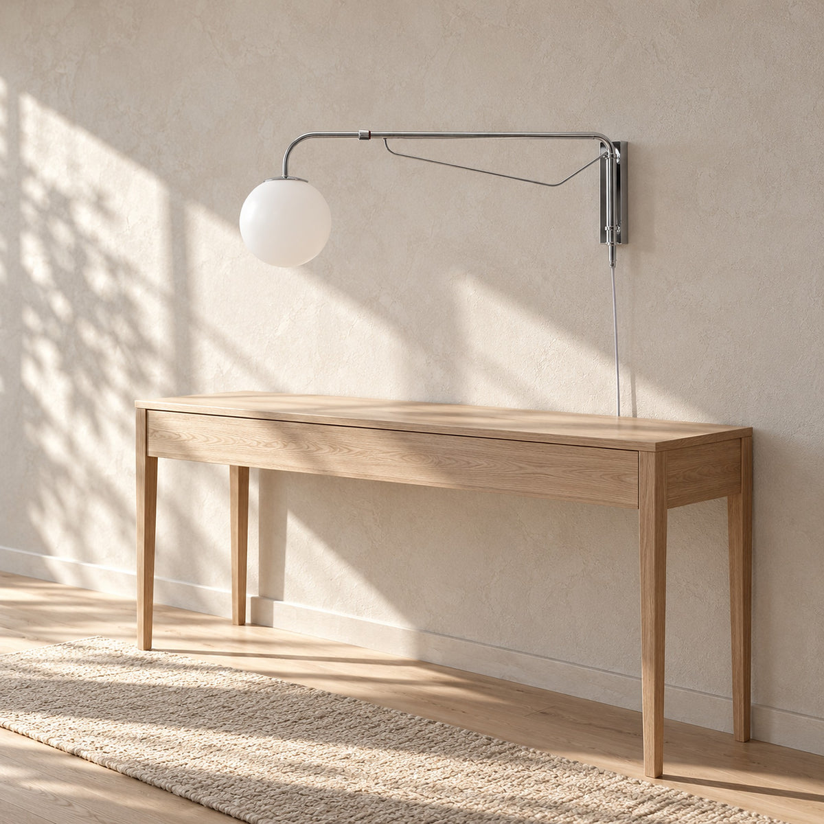 Lirelso chrome and white plug in wall lamp, unlit, mounted above a console table in an entryway