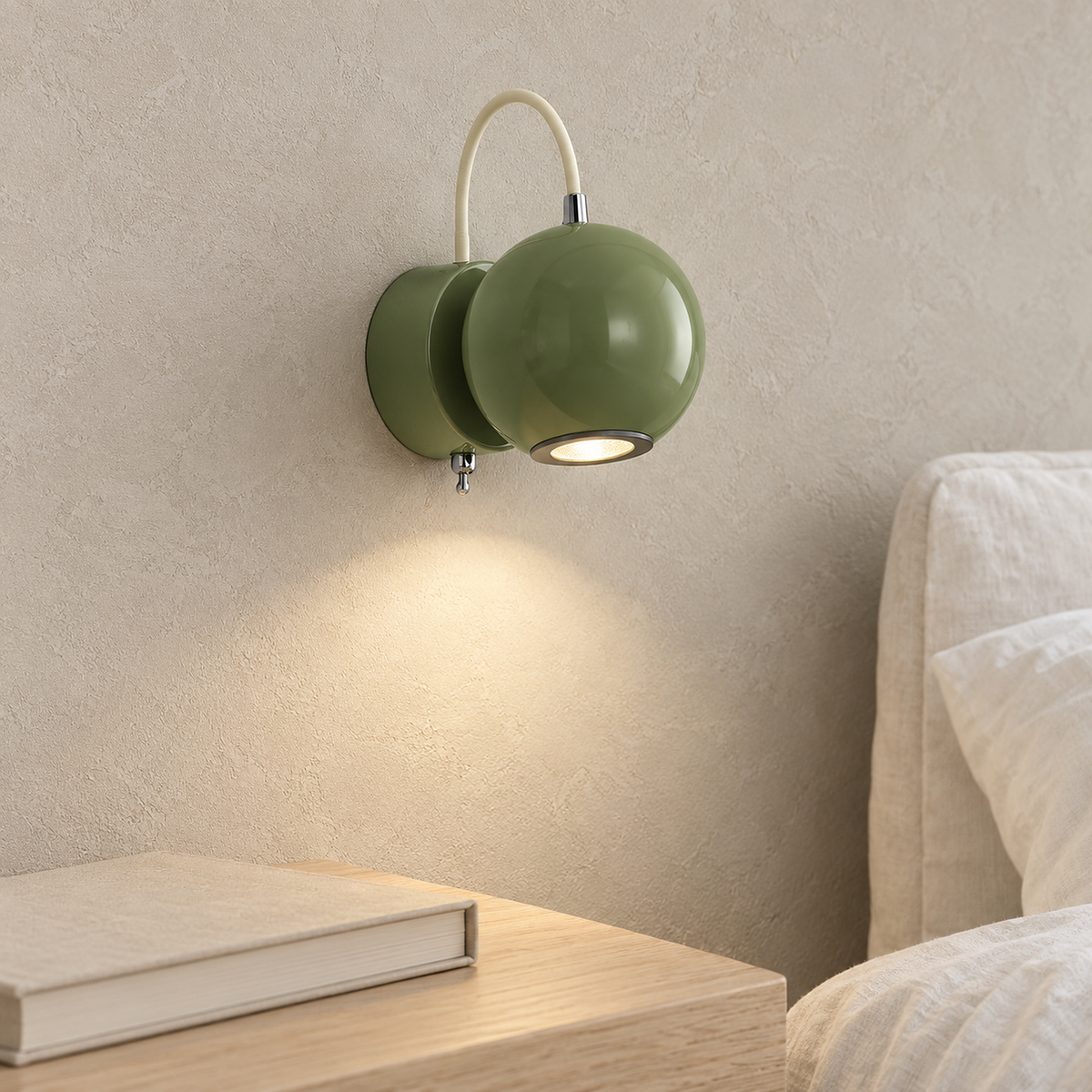 Lirema green hardwired wall sconce with a fingertip on the built in switch