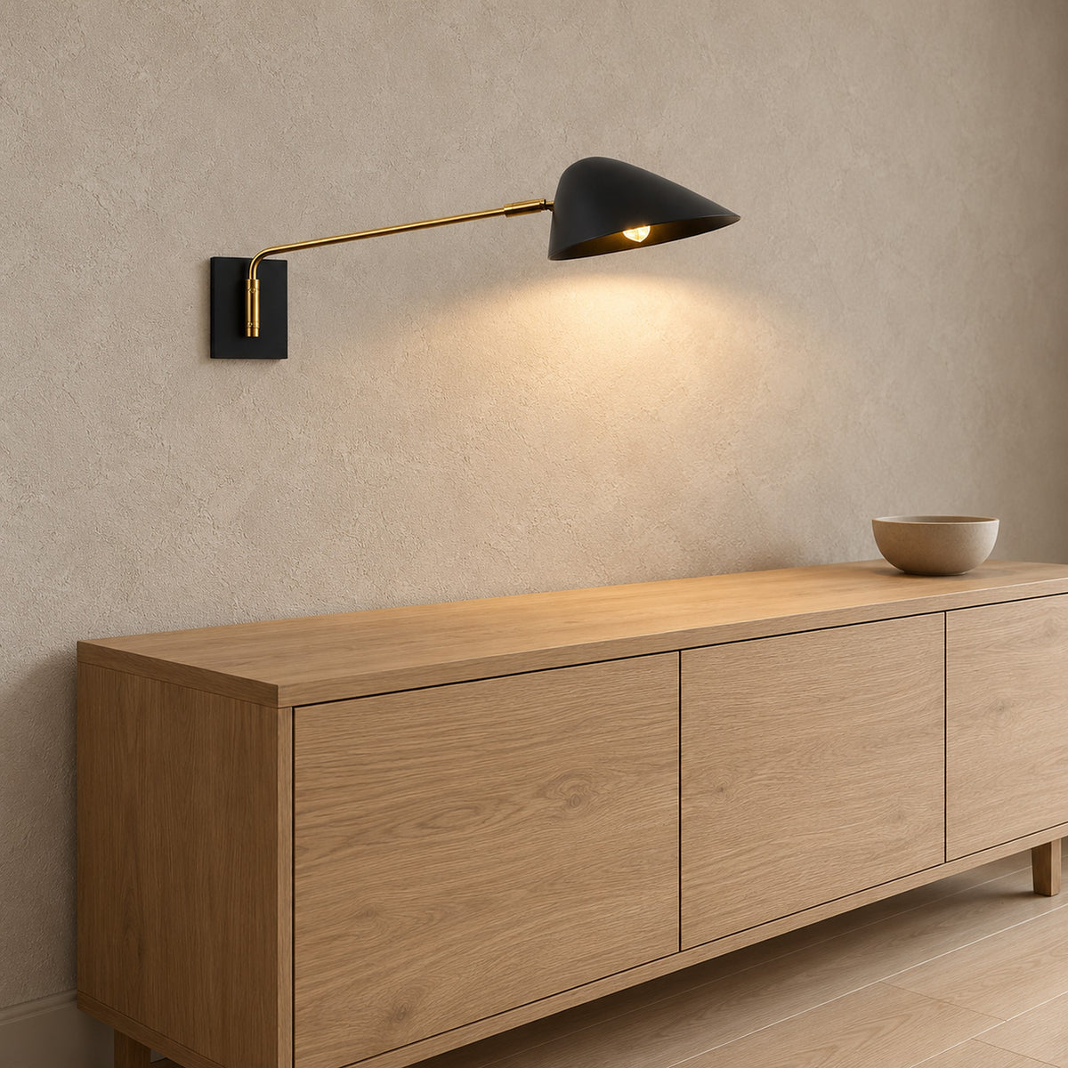Lirmena black wall lamp, detail of the wall mounting plate with bare dining room plaster below
