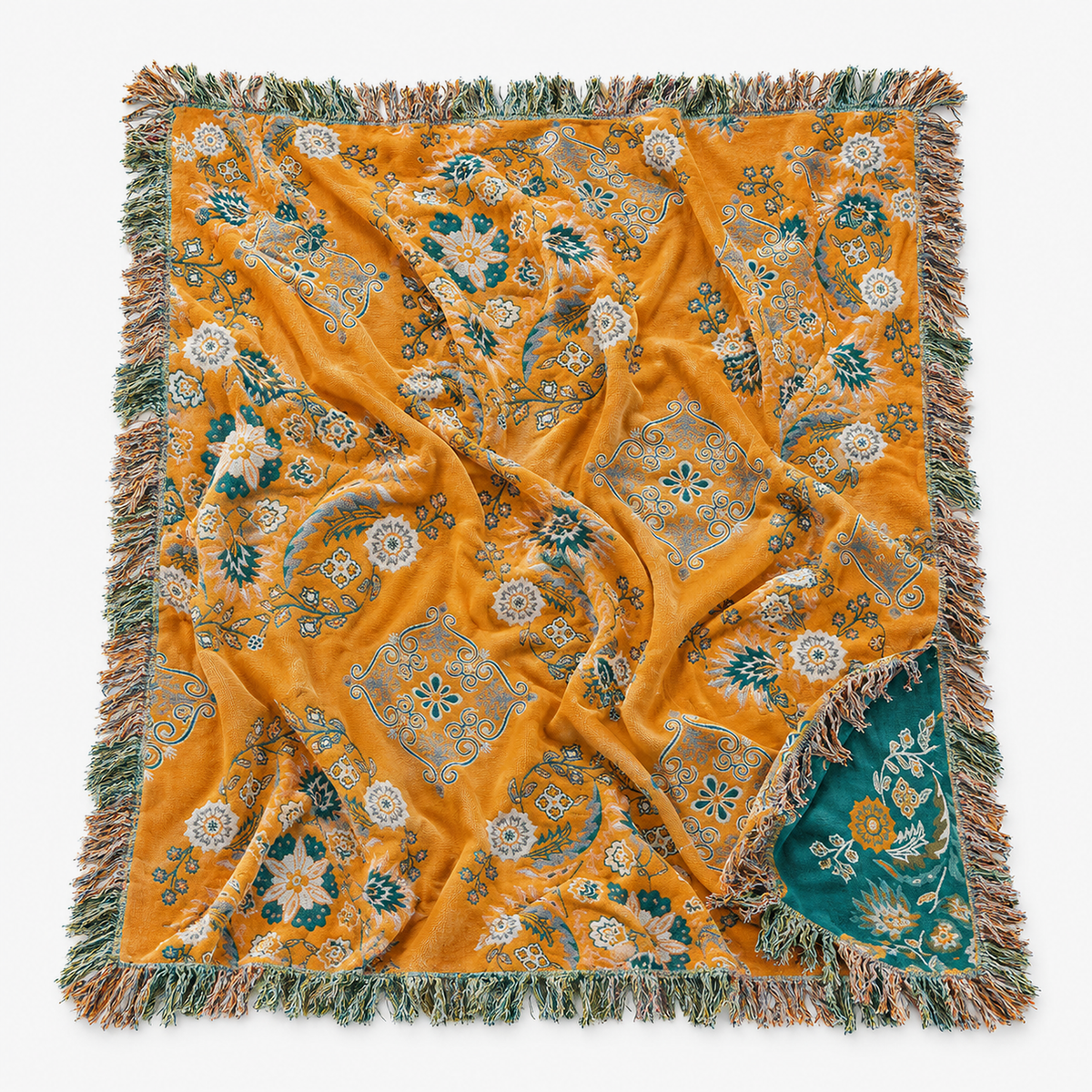 Lisevaro orange gold and teal floral cotton blanket laid open on white, showing the full floral design