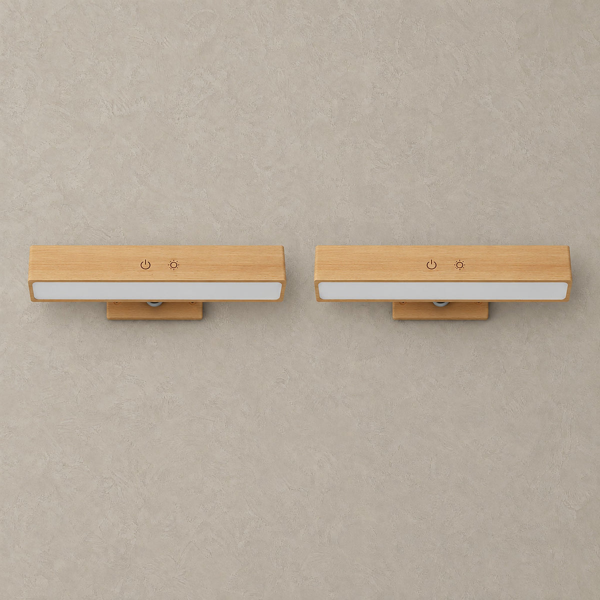 Lisomar main rechargeable wall sconce pair in solid wood, shown unlit against a plain plaster wall