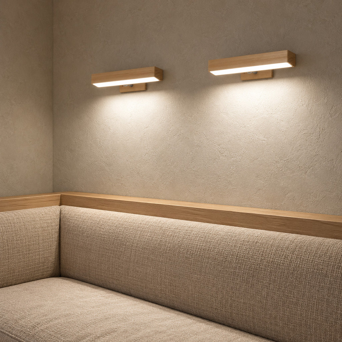 Lisomar main wireless wall light pair giving neutral white light over a dining nook