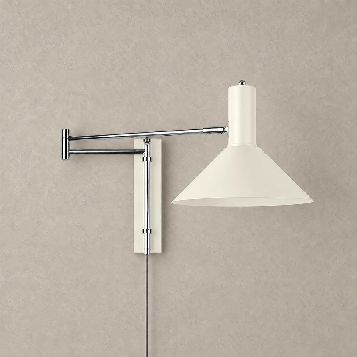 Lomaresi white wall lamp with swing arm, unlit against a greige plaster wall #color_white
