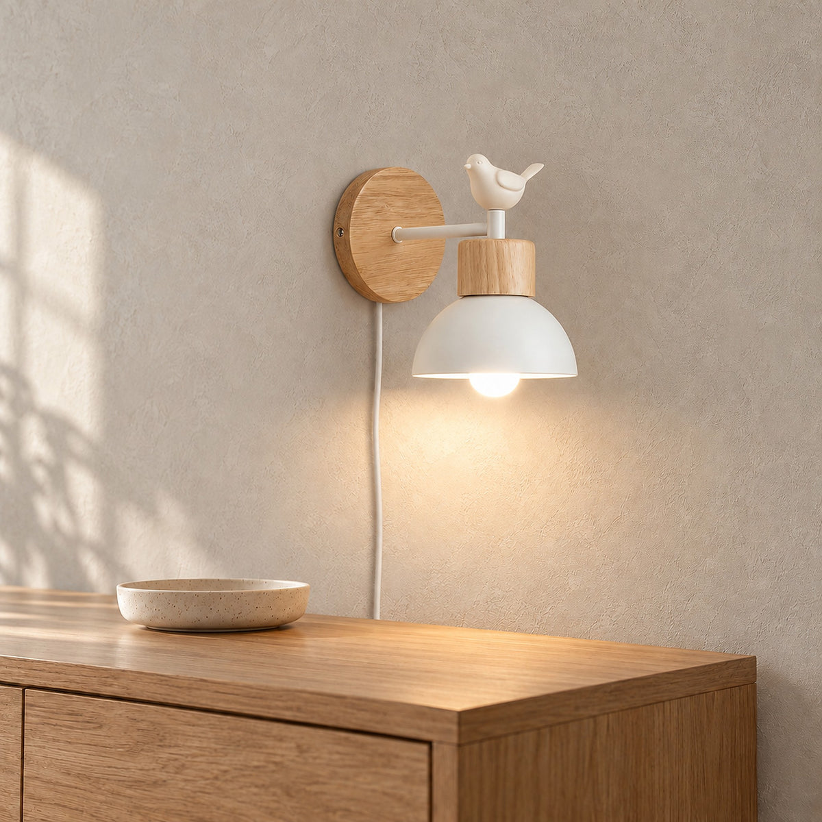 Lorsenta white plug in wall sconce detail of the round wooden plate and straight arm