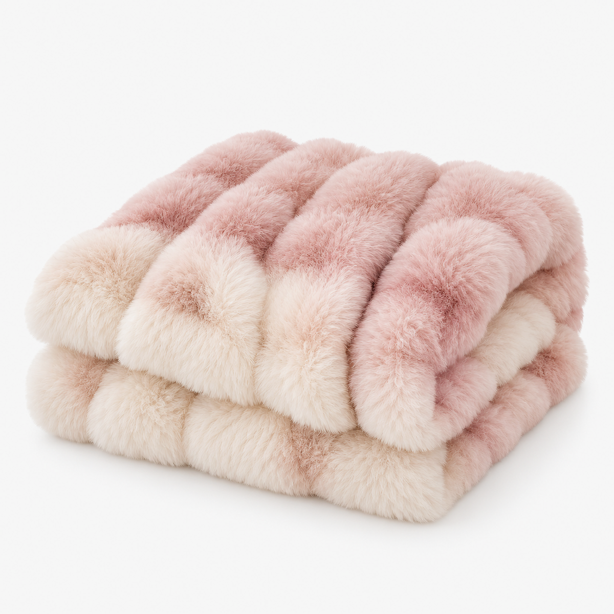 Marvisel pink cream faux fur throw blanket in loose folds on a plain studio backdrop