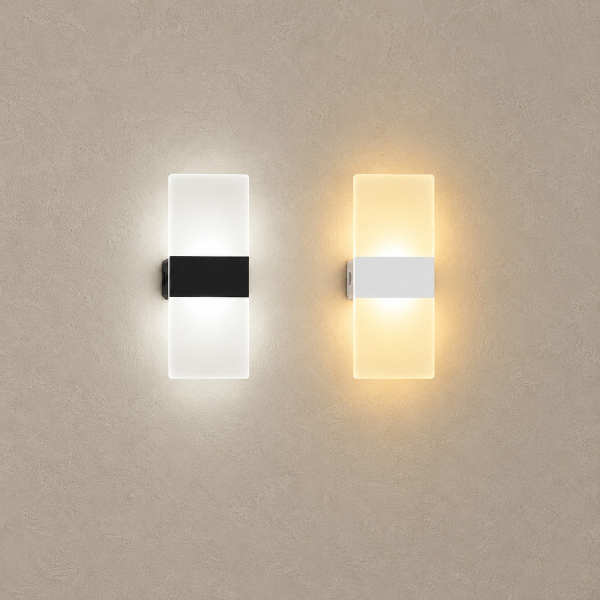 Melavor black and white wall sconces lit side by side, showing both colors of the rectangular light