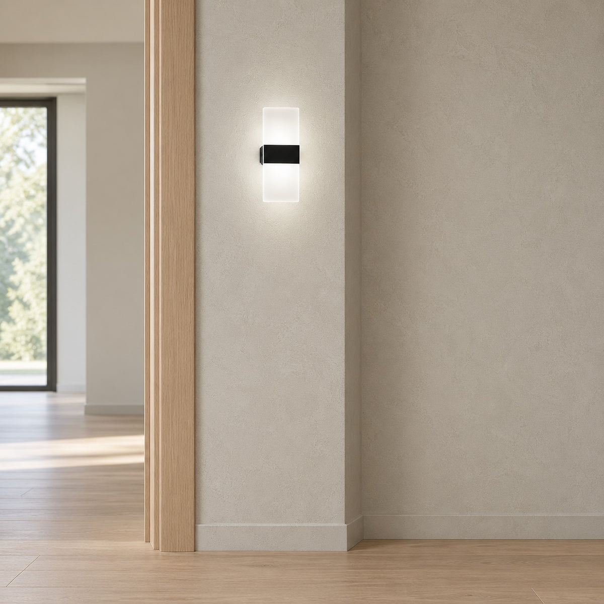 Melavor black cordless wall lamp lighting a hallway wall beside a cropped doorframe