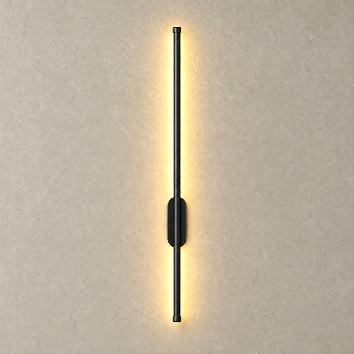 Menalvo black LED wall sconce, linear light casting a warm wash across plaster