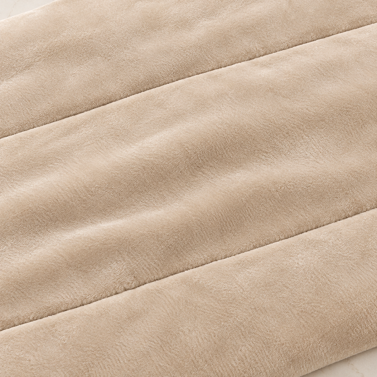 Merivola beige sherpa fleece blanket close up of the knitted milk fleece face in solid color