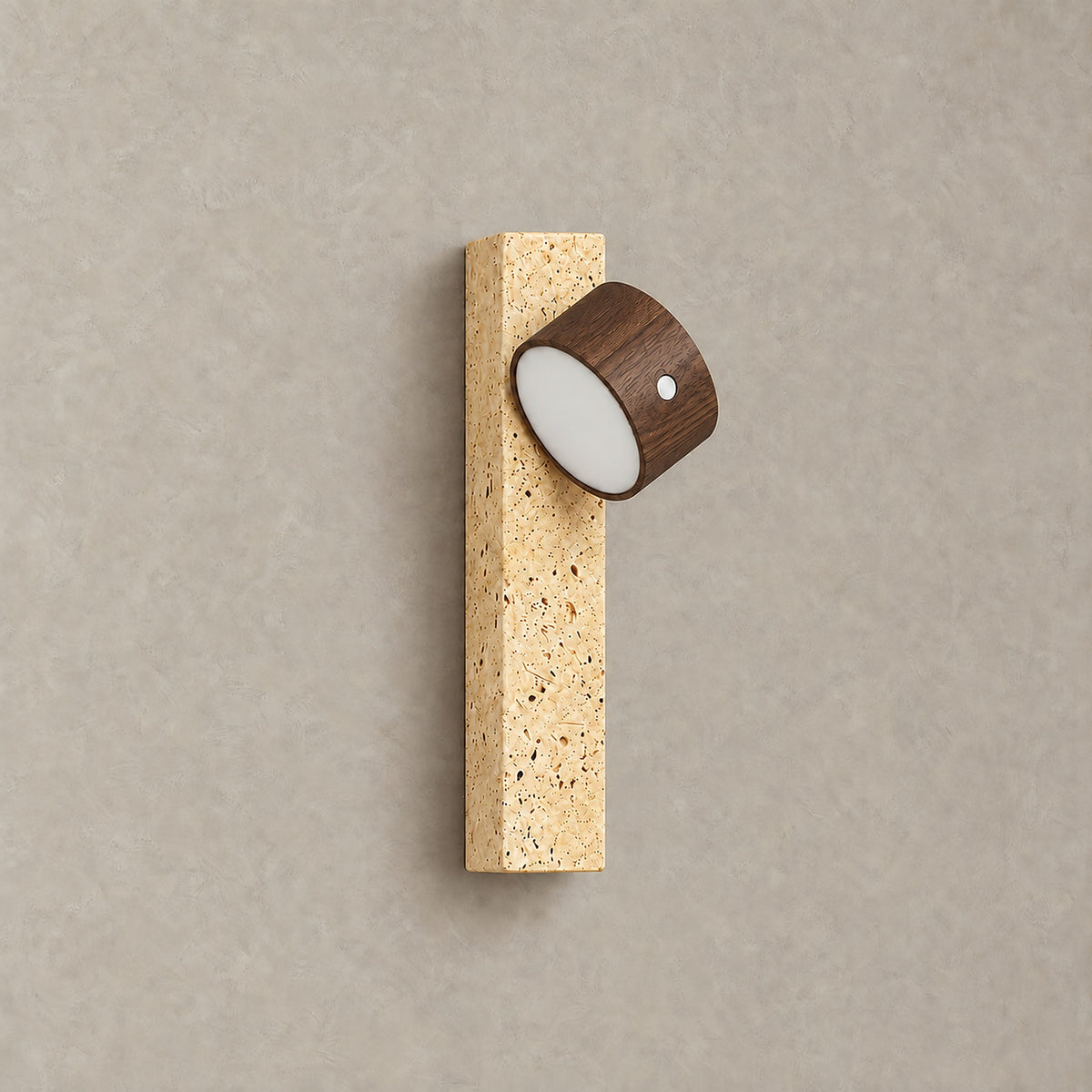 Mernavo dark wood and yellow travertine rechargeable wall sconce switched off on a plain backdrop