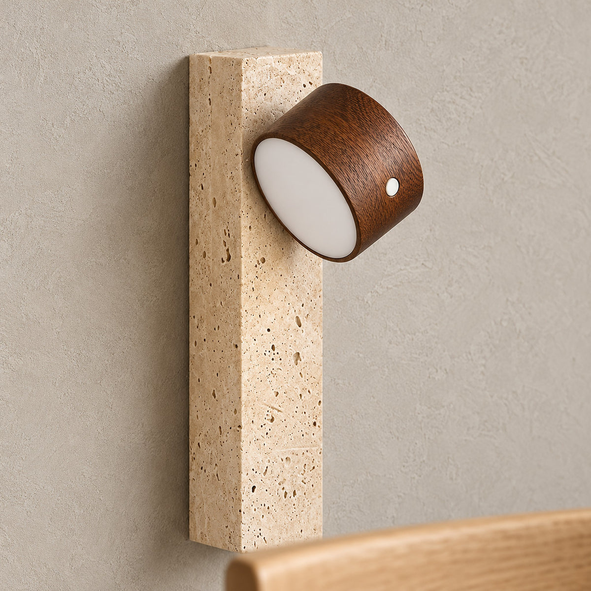 Mernavo dark wood and yellow travertine wall light up close showing wood grain and pitted stone