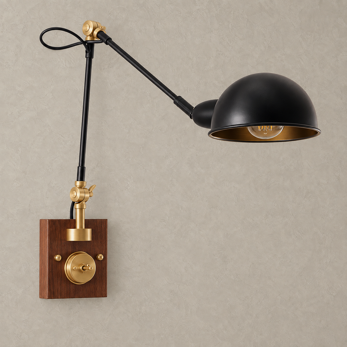 Milorena walnut color and black swing arm wall sconce unlit on a plain studio backdrop