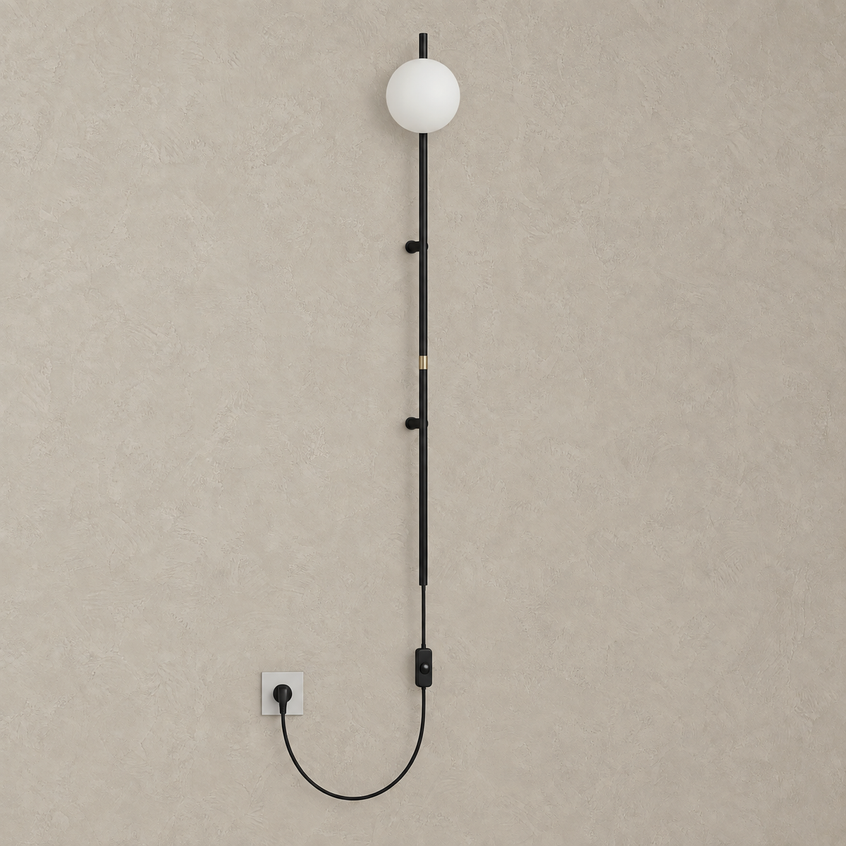 Milorsa plug in wall lamp in black, unlit on a studio plate showing the complete slim pole