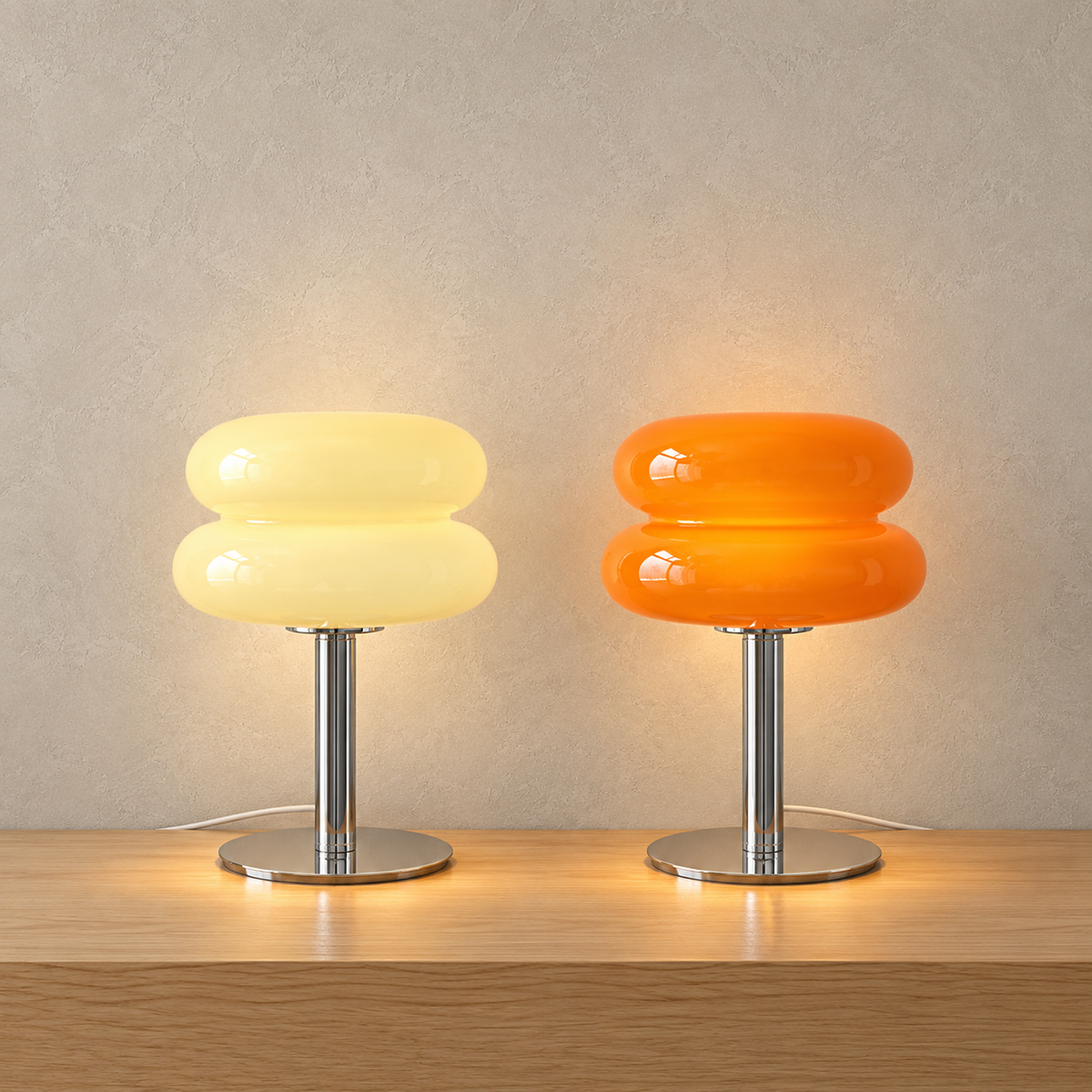 Misolen cream and orange table lamps glowing side by side with stained glass shades