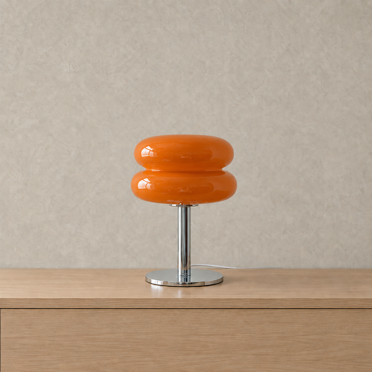 Misolen orange table lamp unlit with a silver colored round base #color_orange