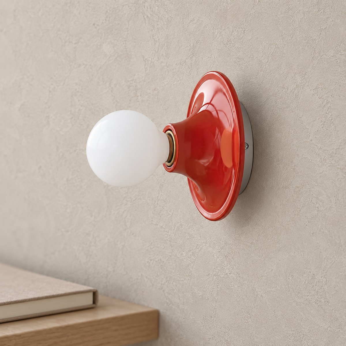 Monterla red plug in wall sconce close up on the dish and socket surround
