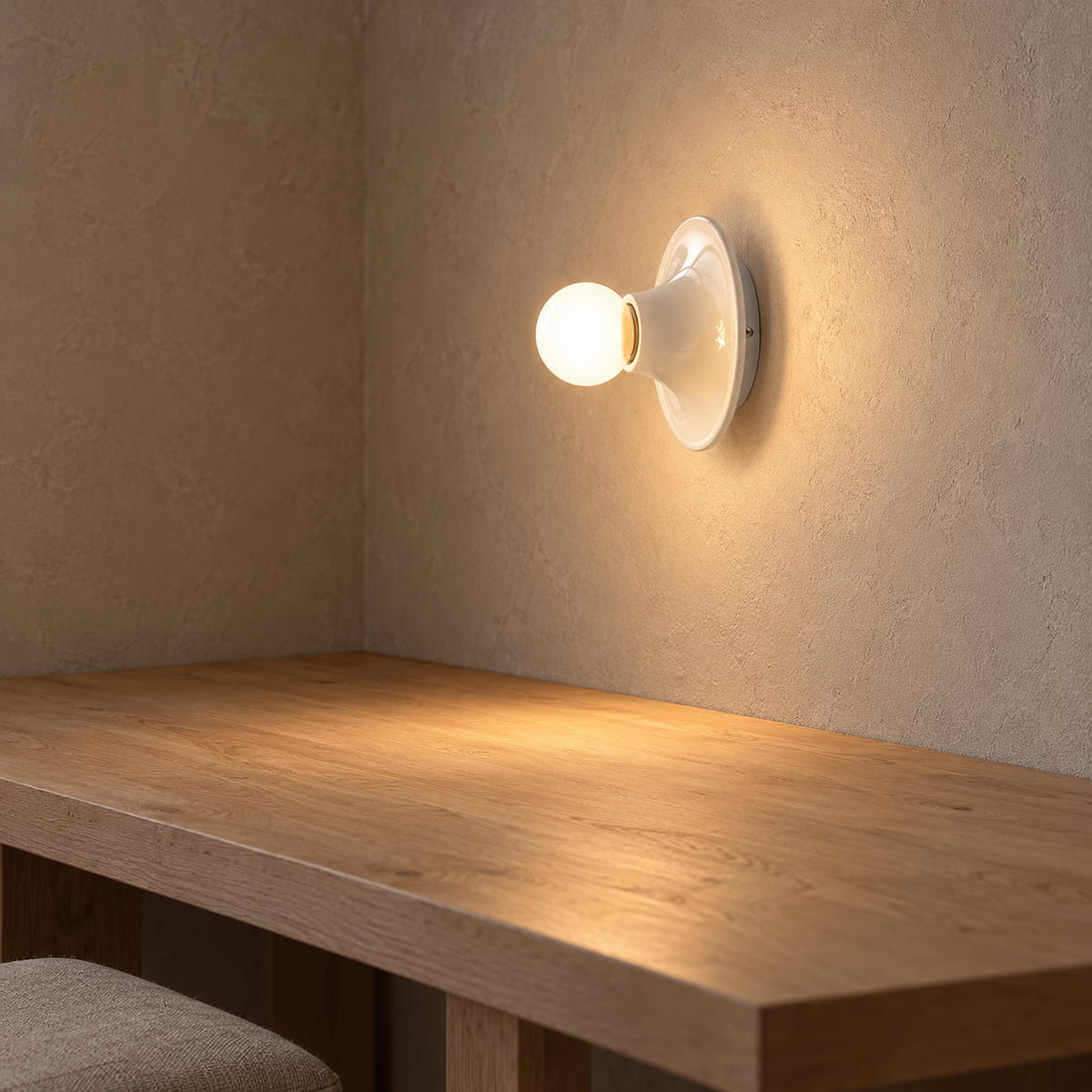 Monterla white plug in wall lamp lighting a craft room and leaving the workbench clear #color_white
