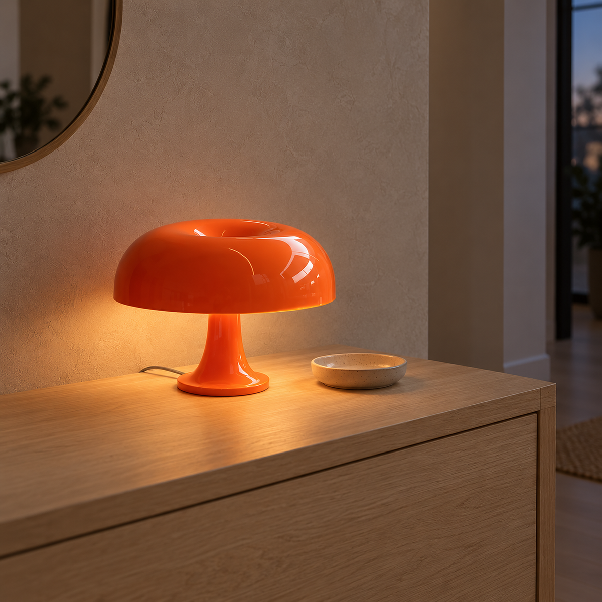 Moranel orange table lamp lit and viewed from above on a console in an entry vestibule