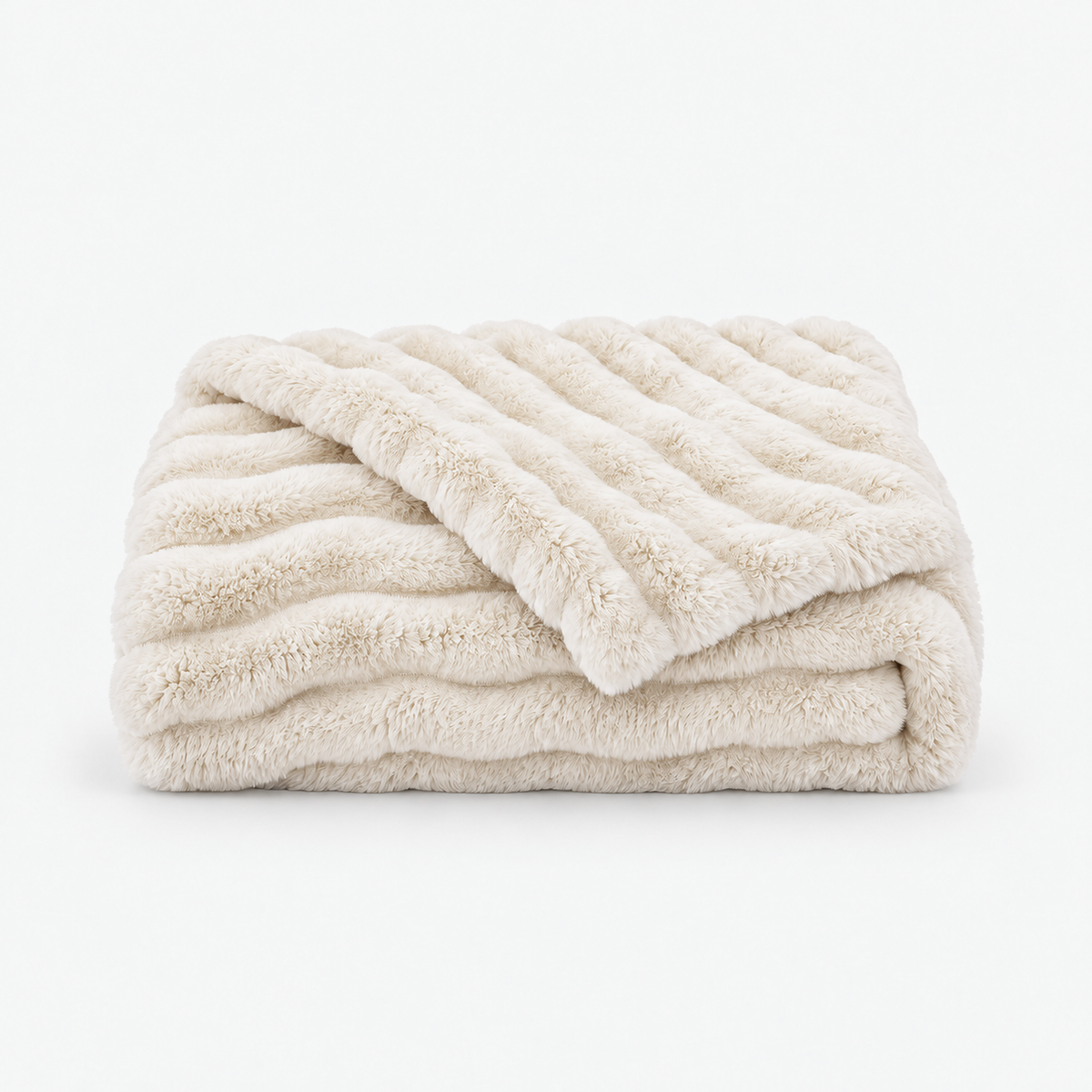 Nalomira ivory white plush fleece blanket folded on a white background with its raised ribbed finish #color_ivory white
