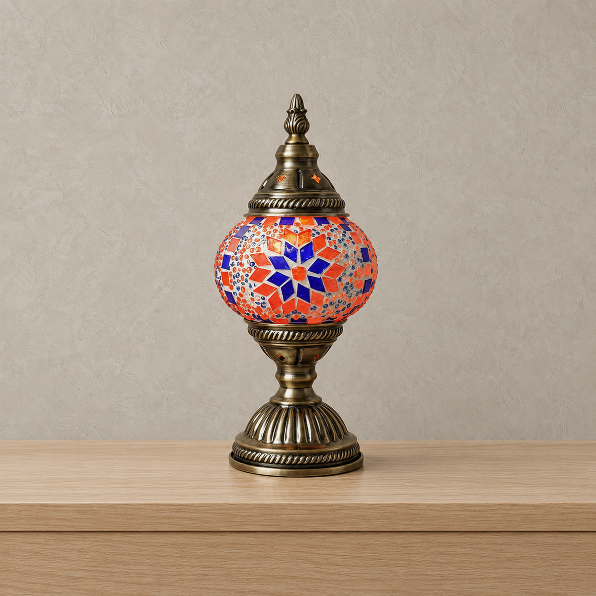 Nalvesa mosaic table lamp with a light bronze finish standing unlit, a glass globe with colored glass mosaic