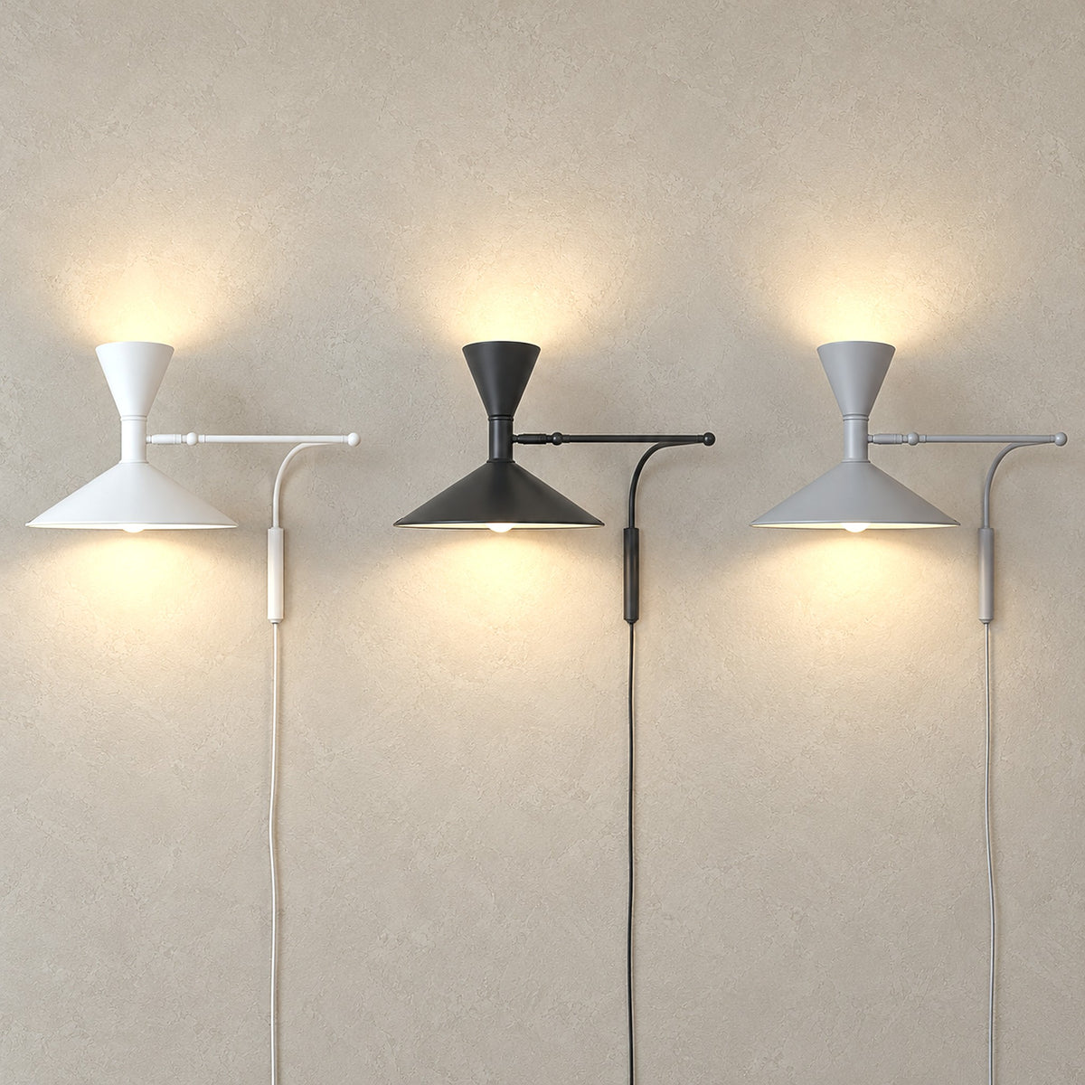 Nalveto white, black and gray plug in wall lamps lit together side by side