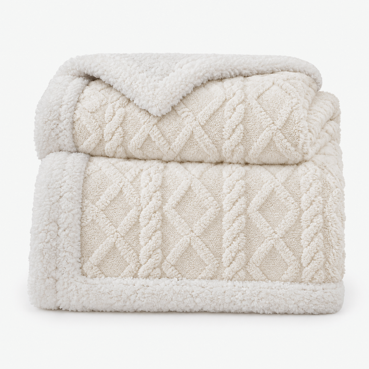 Narelvo creamy white reversible sherpa blanket neatly folded on a white background #color_creamy white
