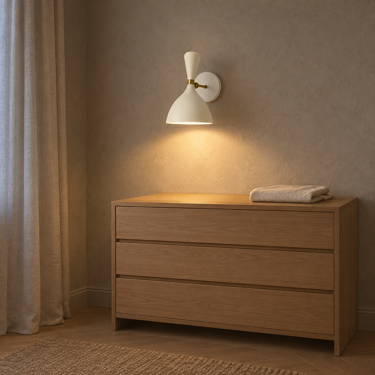 Nematore white wall lamp lit above a dressing chest in a dressing room