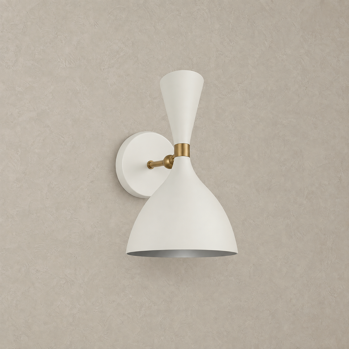 Nematore white wall sconce unlit against a warm greige plaster backdrop