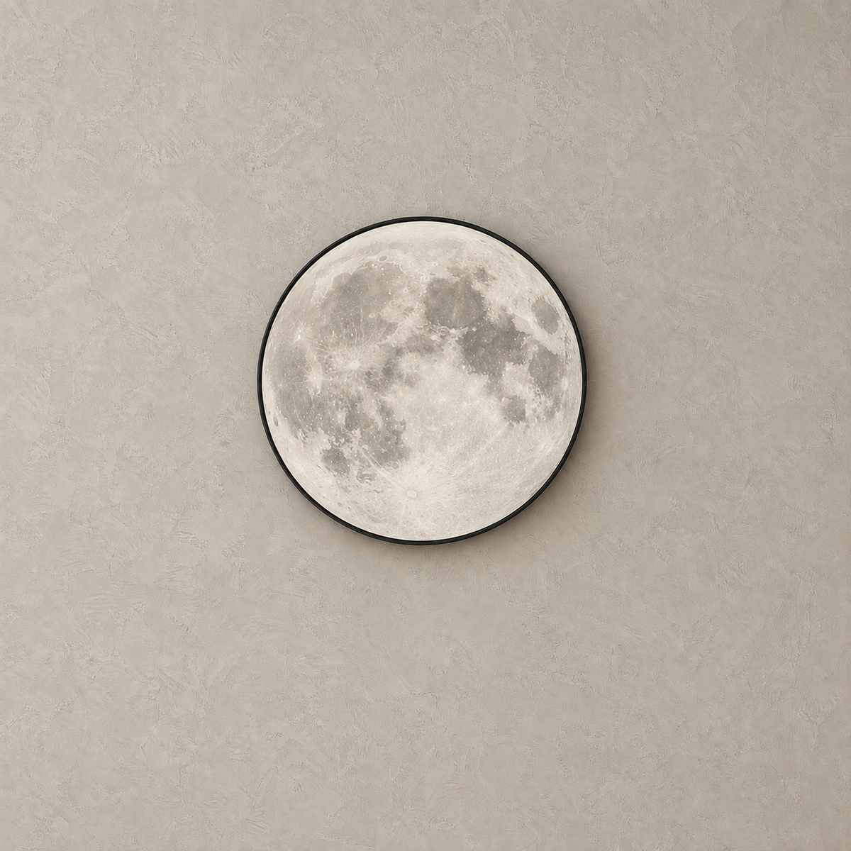 Nerativa moon wall light in black and moon white unlit showing its pale lunar face