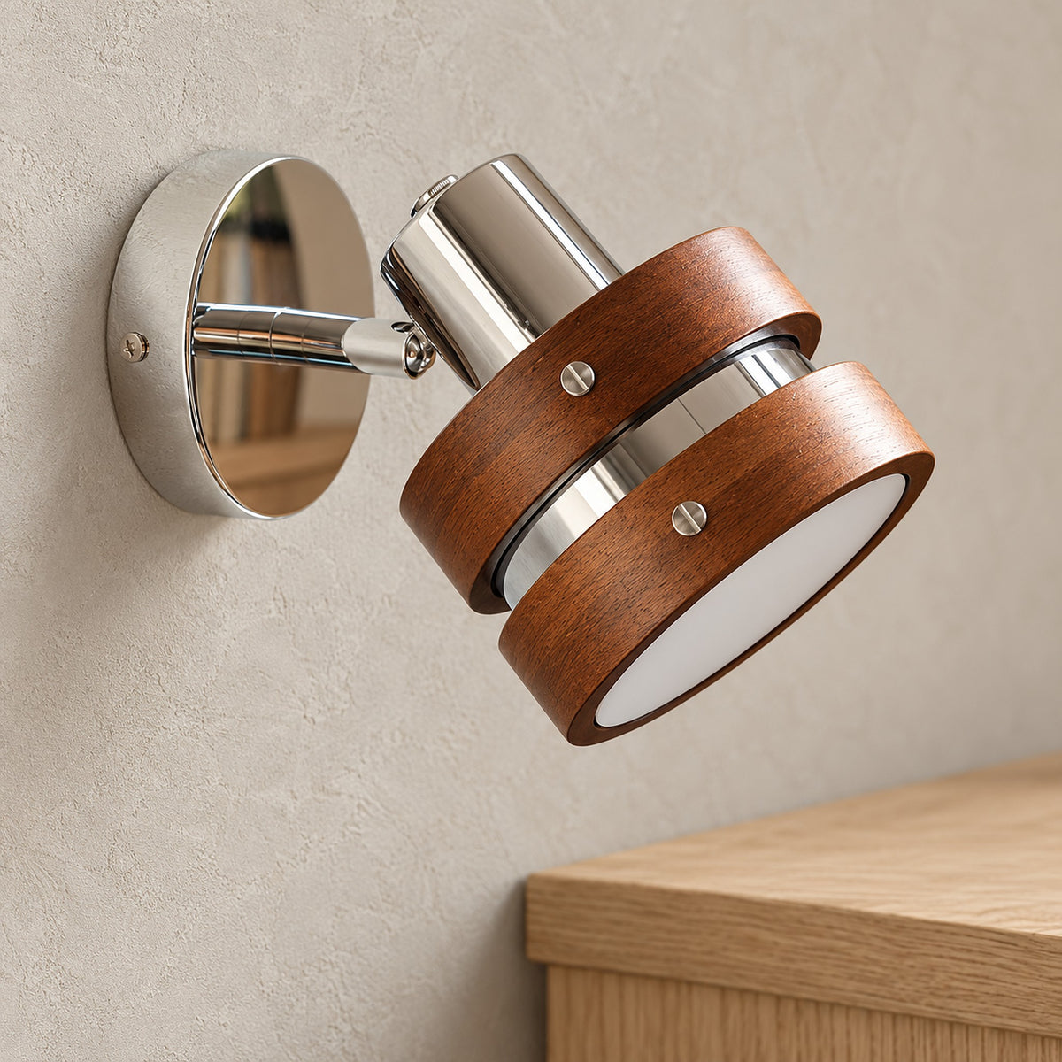 Nerilvo chrome and walnut bedside wall light, close view of wood bands and reflective chrome metal