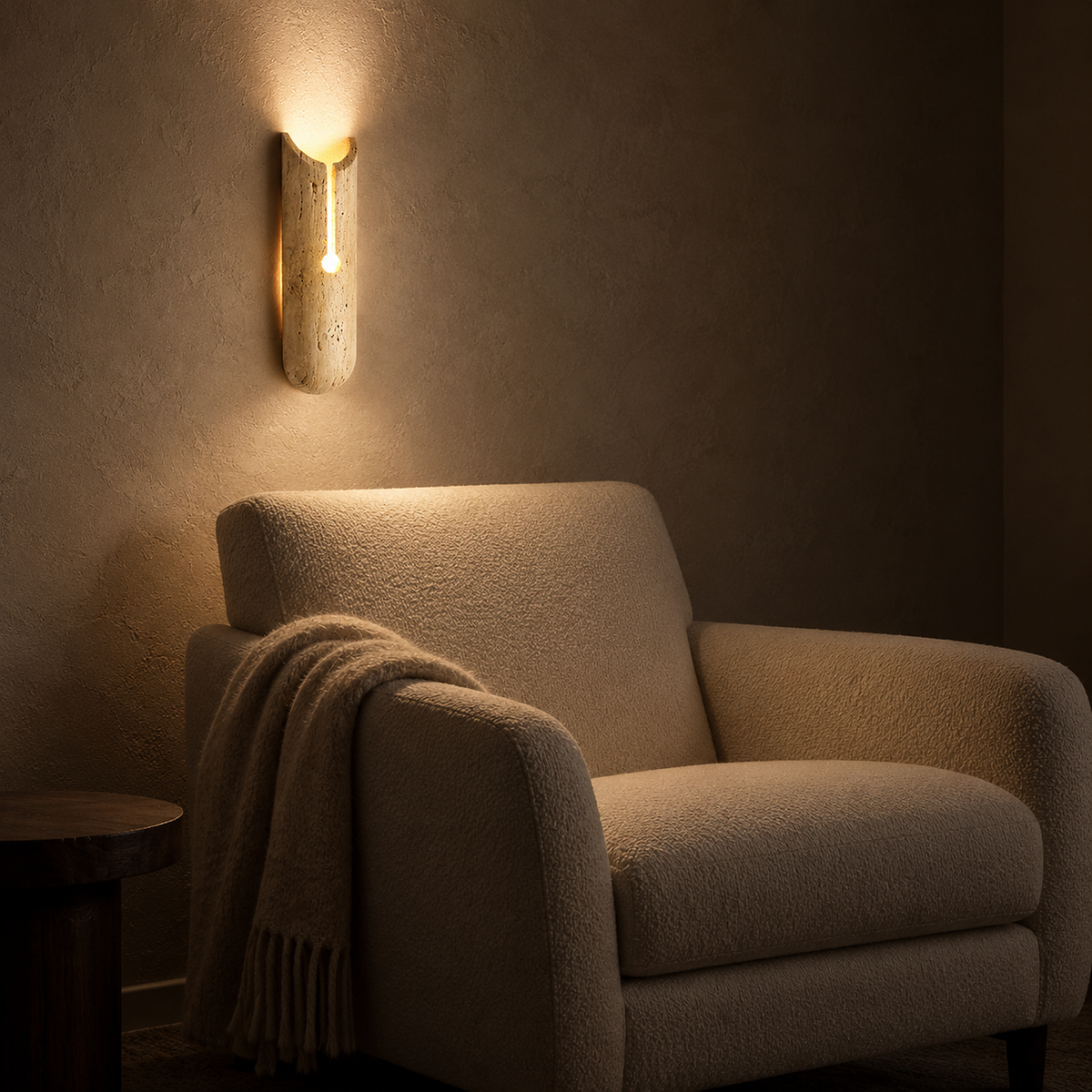 Nerisalo beige wall sconce warming a library corner with a soft glow at night