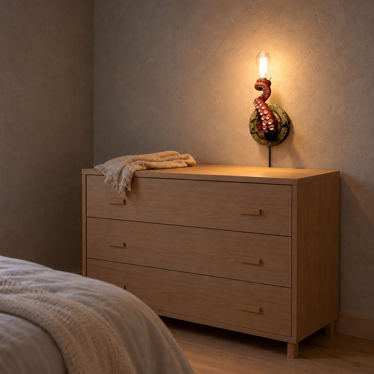 Nevilmo red bedside wall light seen from the side, showing the resin tentacle in profile