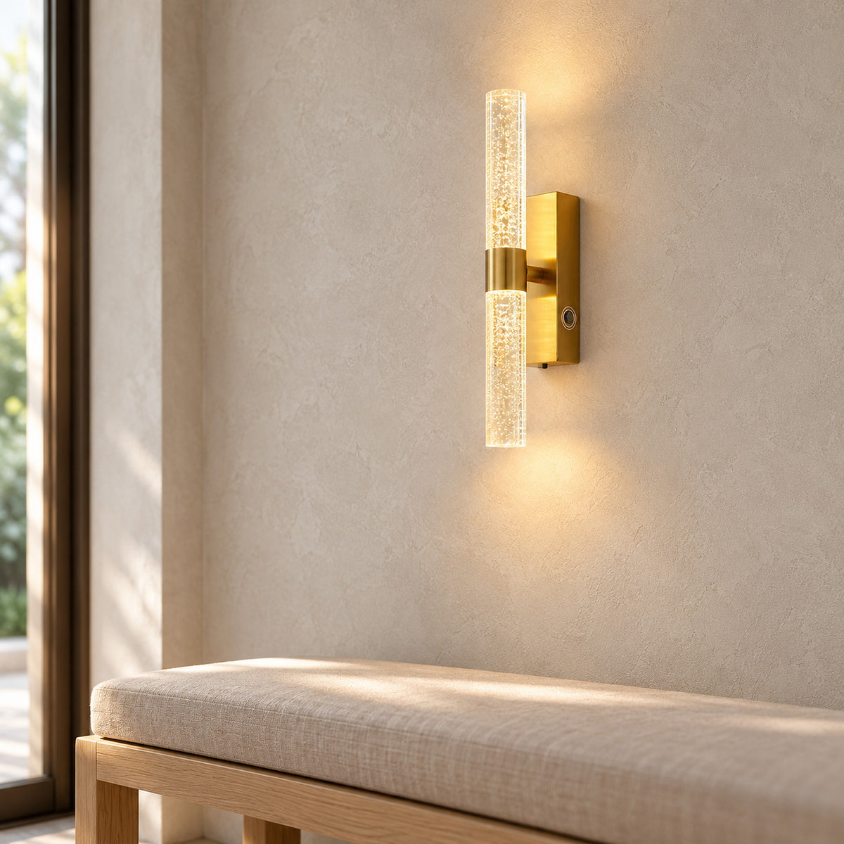 Nimarlo gold rechargeable wall sconce close up of the touch control, lit in an entryway