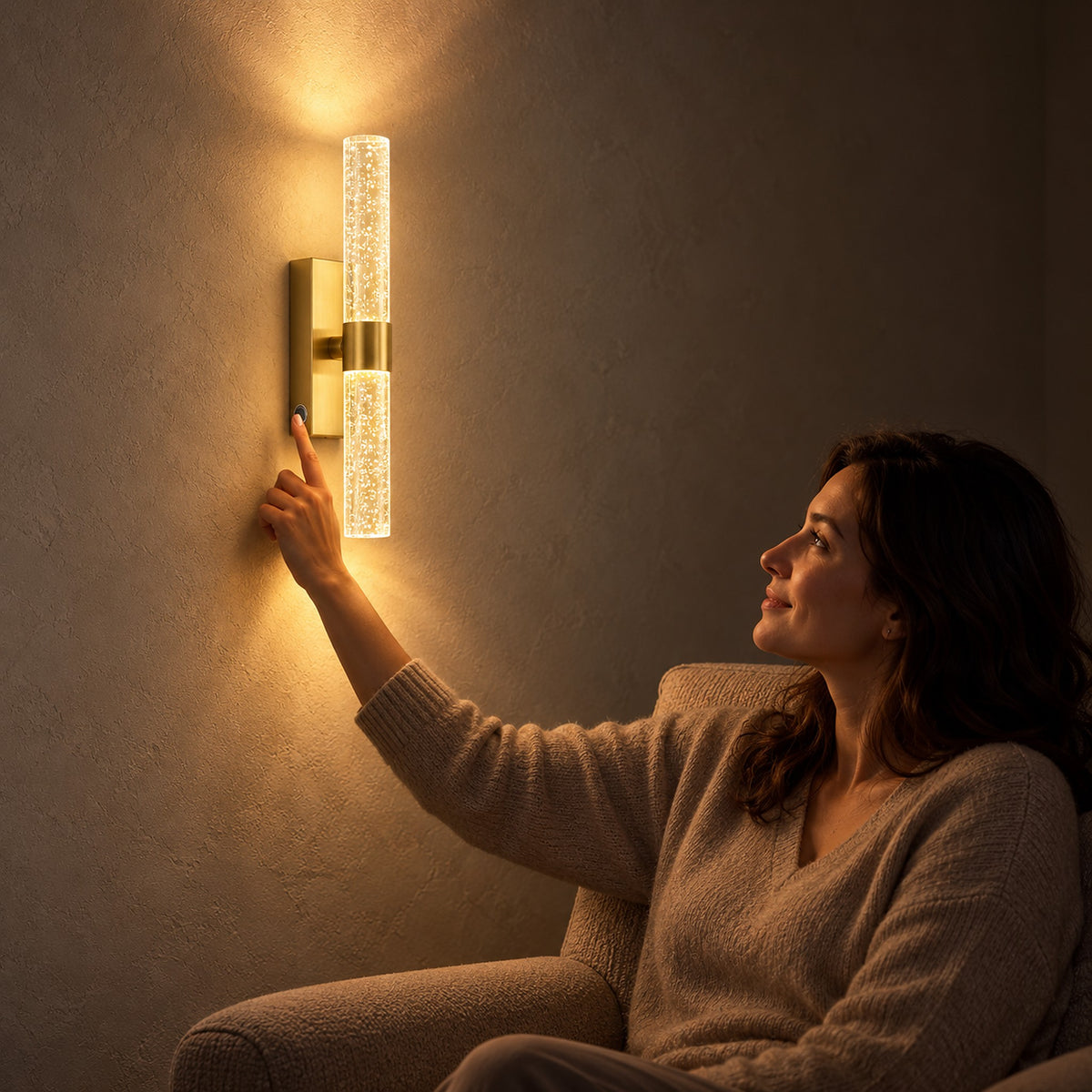 Nimarlo gold wireless wall light switched on by hand with touch control in a library at night