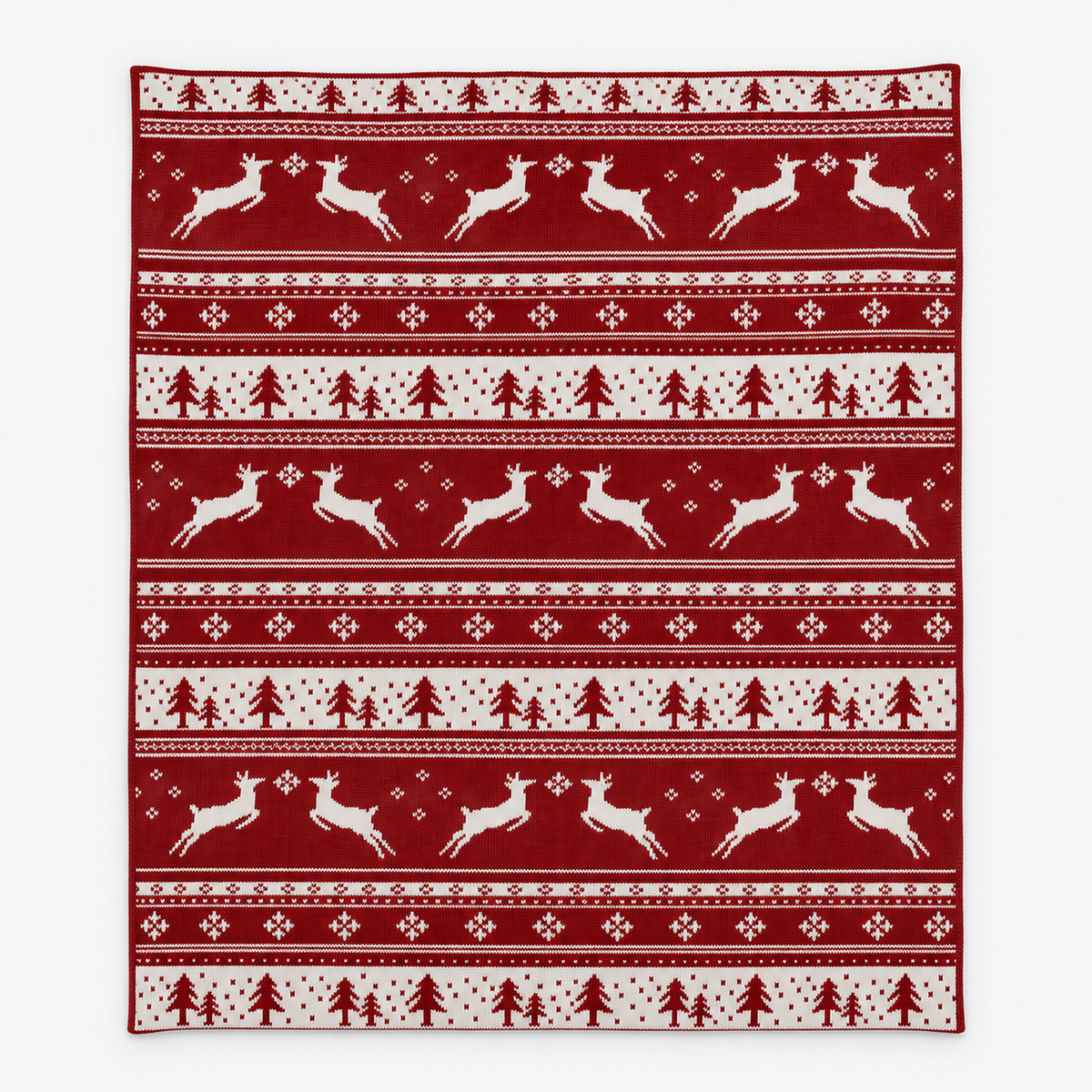 Nisarel crimson ivory christmas knit throw blanket laid flat with the full deer, evergreen and snowflake pattern